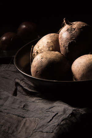 Red juicy beetroot on a dark backgroundの写真素材