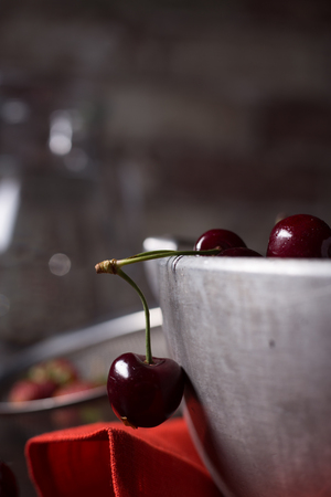 Fresh ripe juicy cherry on the tableの写真素材