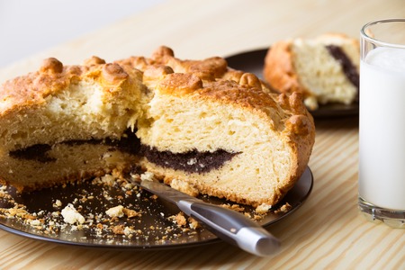 fresh delicious cupcake with poppy seeds on the kitchen tableの写真素材