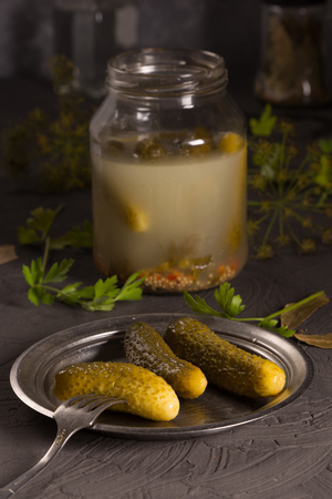 Pickled Vegetables homemade on the table. Low key presentationの写真素材
