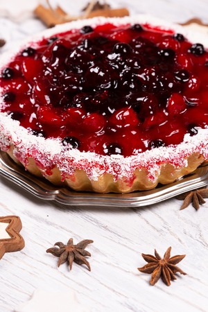 Sweet cake with cherry jelly, tasty and freshの写真素材