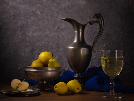 Traditional still life with an old jug, wine and pearsの写真素材