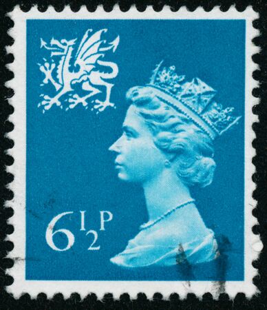 POLTAVA, UKRAINE - JUNE 26, 2019. Vintage stamp printed in Great Britain 1976 shows Queen Elizabeth II, Regional Definitives, Walesのeditorial素材