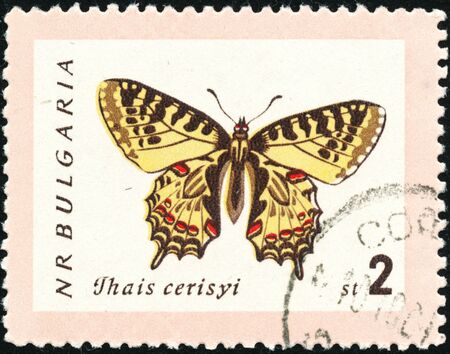 POLTAVA, UKRAINE - October 17, 2019. Vintage stamp printed in Bulgaria circa 1962 show butterflyのeditorial素材