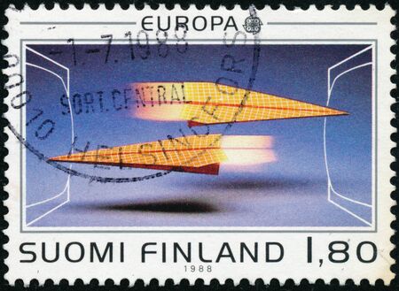 POLTAVA, UKRAINE - January198, 2020. Vintage stamp printed in Finland circa 1988 show EUROPA - Transportation and Communicationsのeditorial素材