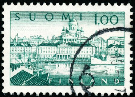 POLTAVA, UKRAINE - January 19, 2020. Vintage stamp printed in Finland circa 1963 show Helsinki harbourのeditorial素材