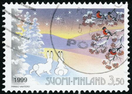 POLTAVA, UKRAINE - February 16, 2020. Vintage stamp printed in Finland circa 1999 show Christmasのeditorial素材