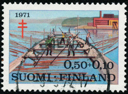 POLTAVA, UKRAINE - May 15, 2020. Vintage stamp printed in Finland circa 1971 show prevention of tuberculosis - Timber Industryのeditorial素材