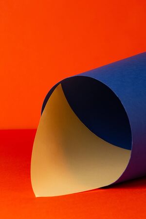 Asymmetric, abstract geometric background using orange, blue and yellowの写真素材