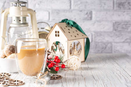 Christmas concept with hot drink and accessories on the tableの写真素材