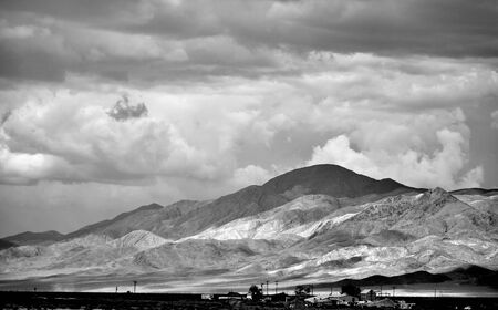 In coming storm over the mountains. On the road from Reno to Los Angeles.の写真素材