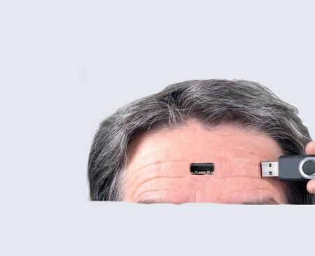 Man with usb connetion in head.