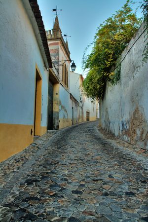Old-looking street in Evora, Portugal. HDR processed image.