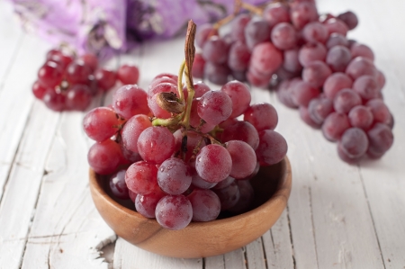 Red sweet grapes in the bowl, selective focusの写真素材