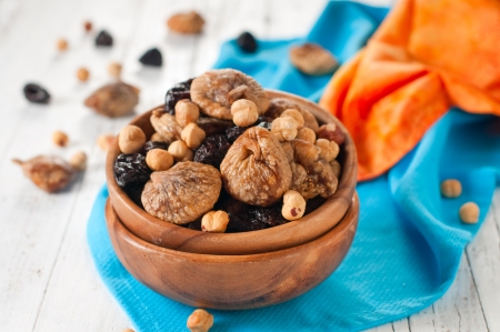 Dried figs, nuts and plums, selective focusの写真素材