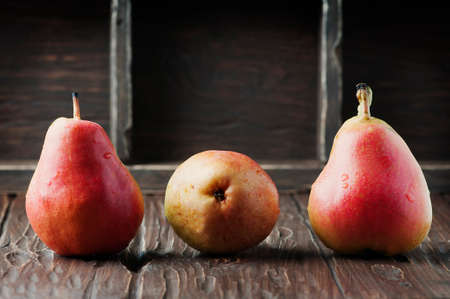 Red sweet pears on the vintage table, selective focusの写真素材