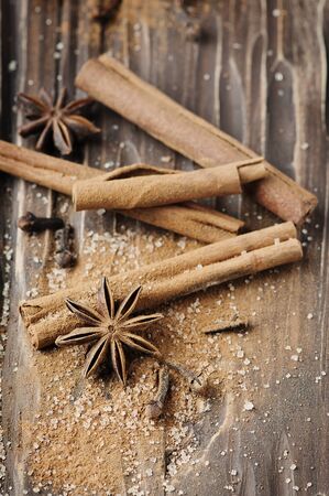 Spices cinnamon and anise on the wooden table, selective focusの写真素材