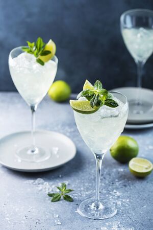 Summer cocktail mojito with rum, lime and mint, selective focus imageの写真素材