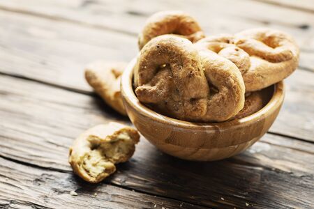 Traditional Italian bread taralli from Naples, rustic style and selective focusの写真素材