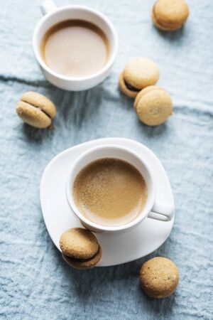 Baci di dama italian hazelnut biscuits cookies with chocolate cream, selective focusの写真素材