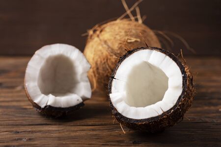 Fresh coconut on the wooden table, selective focusの写真素材