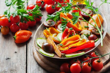 Grilled vegetables on the wooden table, selective focusの写真素材