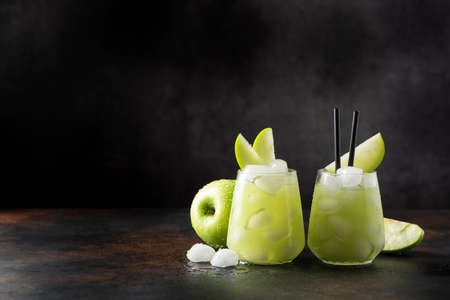 Summer cocktail with green apple and ice. Selective focus image with copy spaceの写真素材