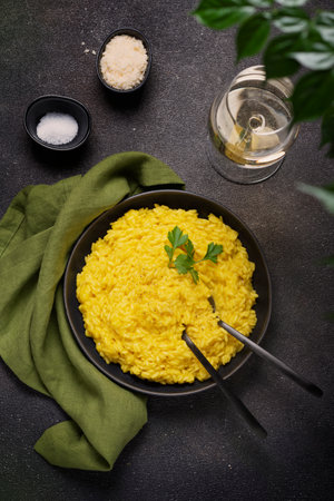 Traditional Italian risotto with saffron, top down view imageの写真素材