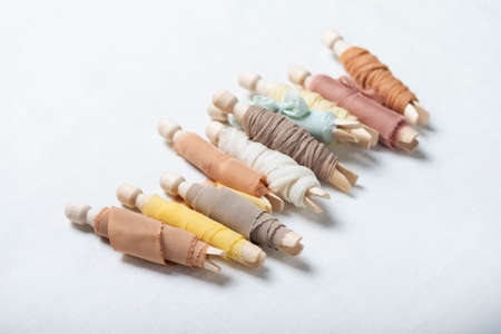 Pattern with handmade colored silk ribbons, selective focus image