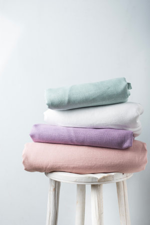 Sewing concept: linen fabric in different pastel colors, selective focus imageの写真素材
