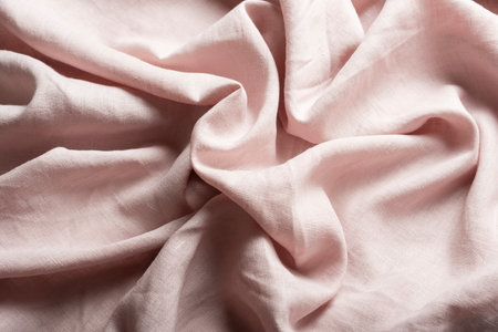 Tailor shop concept: light pink linen fabricの写真素材