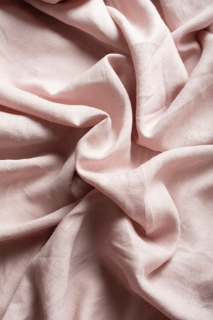Tailor shop concept: light pink linen fabric