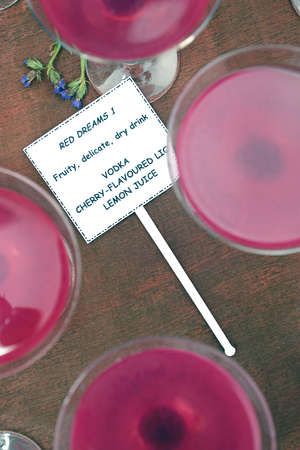Pink cocktails with a sign shot from the topの写真素材