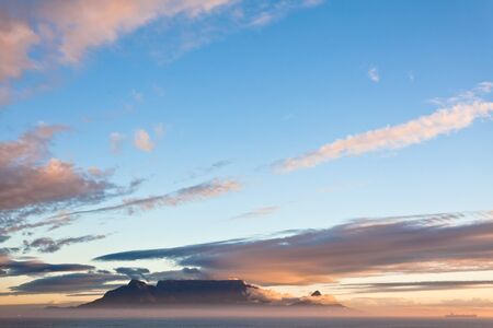 Table Mountain in Cape Town late afternoon view from Blouberg.の写真素材