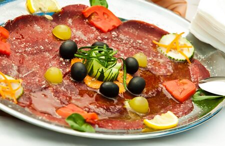 Salami and ham platter presentationの写真素材