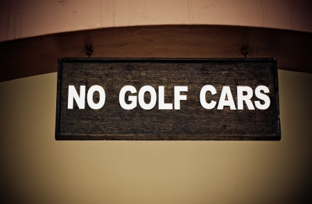 Country golf couse warning, old people walking の写真素材
