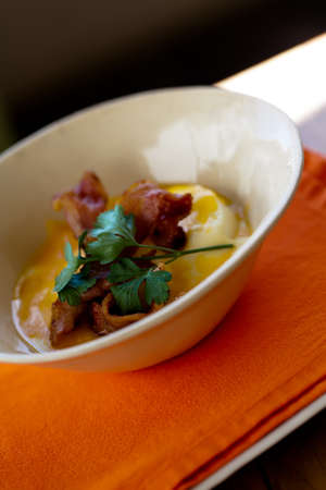 Bacon and eggs in a bowl の写真素材