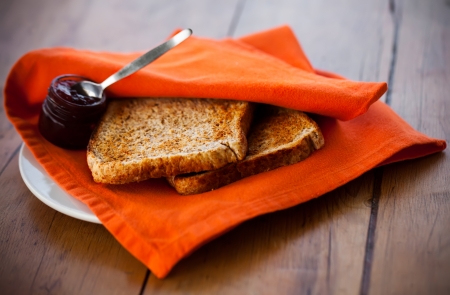 Toast with jam and orange servet の写真素材