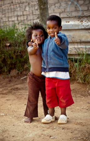 Two small kiddies â¦hey hey, everything is ok.の写真素材