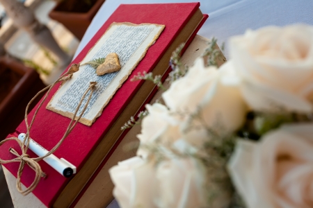 The red memory book holds a lot of memories.の写真素材