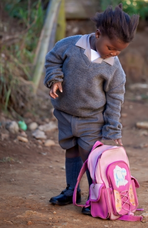 She is on her way to her first day in the big school.の写真素材