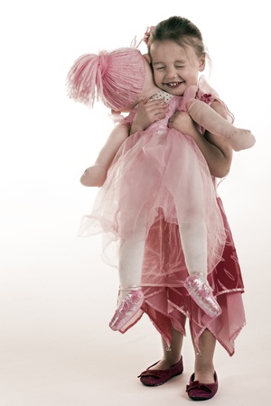 A little girl with her most favourite friend in the whole world.の写真素材