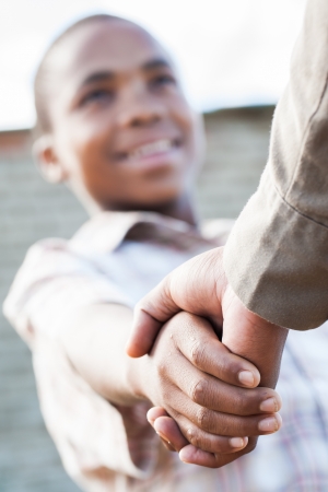 The two brothers agreed to split their salary in half の写真素材