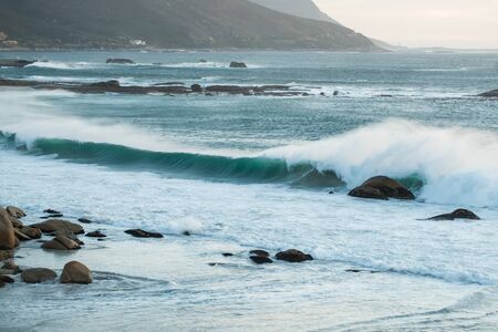 The cyan almost transparent water of Cape Town.の写真素材