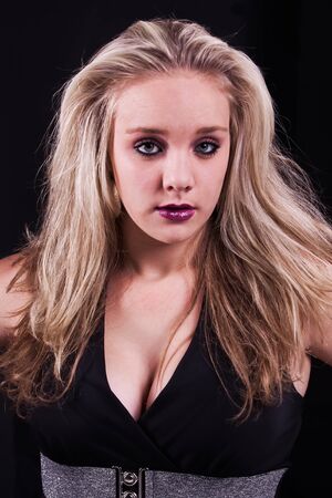 A young hair model with beautiful golden locks.の写真素材