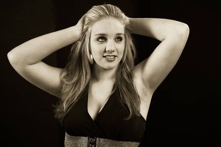 A sepia photograph of a young hair model.の写真素材