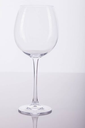 A wine glass on the backdrop.の写真素材