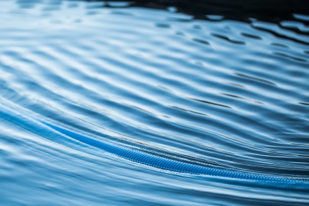 Artistic and twirl water, photograph of  a pool cleaner.の写真素材