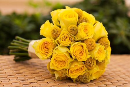 A beautiful yellow frose bouquet for the bride.の写真素材