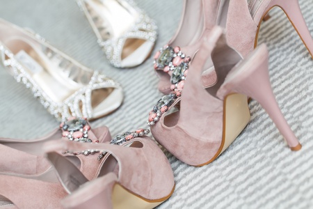 The bride and her bridesmaids's shoes being photographedの写真素材